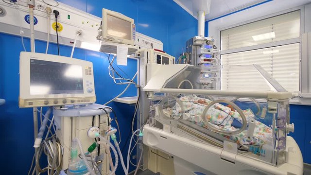 Medical unit with modern equipment and a baby in the incubator