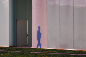 Shadow of people projected on the bus station of Pamplona, Spain