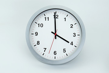 Gray clock beginning of time 04.00 am or pm, on white background, Copy space for your text, Time concept.