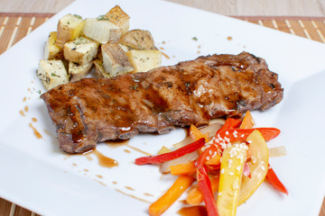  caramelized baked rib, potatoes and salad