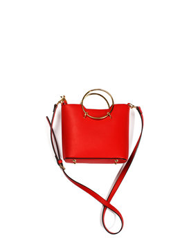 Fashion red leather handbag isolated on a white background