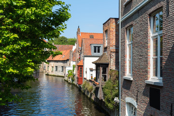 Ancient building facades on river canal, Europe