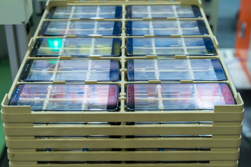 robotic screen protector film or glass cover in manufacture phone factory