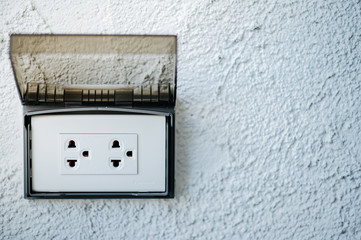 Wall socket to wall of bedroom