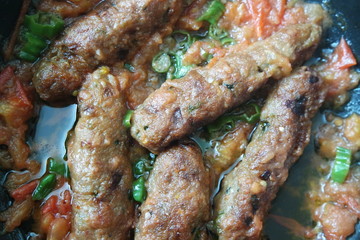 Delicious spicy home made fried kebab with green pepper