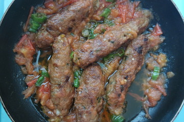 Delicious spicy home made fried kebab with green pepper