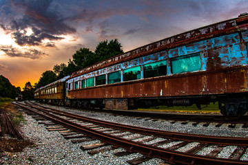 Fototapeta na wymiar abandoned railway in the sunset