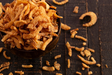 Fried Onions for Green Bean Casserole or Salad Garnish on a Wooden Table