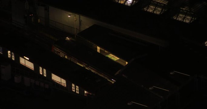A train at Shinagawa stration in Tokyo at night