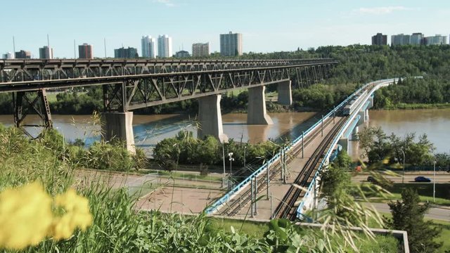 Edmonton C-train Goes Across High Level Bridge in Downton Edmonton Above the North Saskatchewan River During Summer