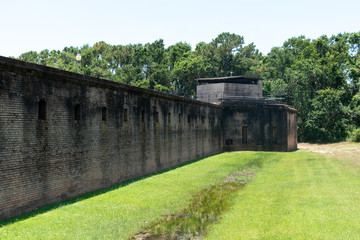 The walls of Fort Gains built to defend Mobile bay and was used in the Civil War
