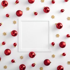 Naklejka na ściany i meble Red christmas ball and gold snowflake with white paper frame