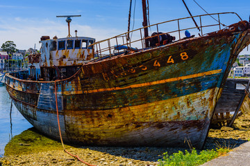 Fototapeta na wymiar Old abandoned ship in the port of Camaret-sur-Mer.Brittany. France