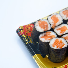 Sushi Roll with salmon on the white background .Food abstract background