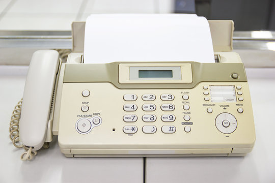 The Fax Machine For Sending Documents In The Office