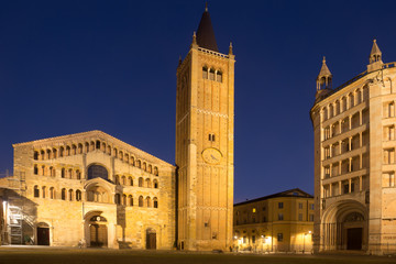 Fototapeta na wymiar City square with Baptistery and Cathedral of night Parma in Italy