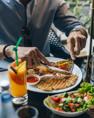 chicken langet with potatoes on the table