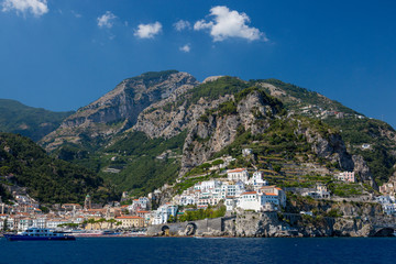 Naklejka premium View from the sea to the town of Amalfi in Italy on the coast of the Tyrrhenian Sea