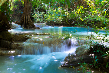 Fototapeta na wymiar Erawan Waterfall beautiful with green natural
