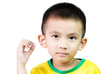 Child boy an 5 years old holding cotton swab stick for ear cleaning on white background.
