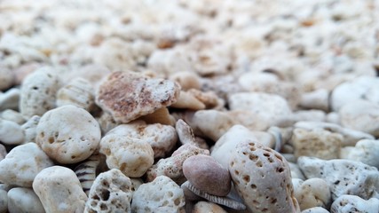 gravel on the beach with defocus background
