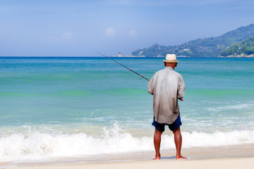 Native fisherman on the beach, Thailand.