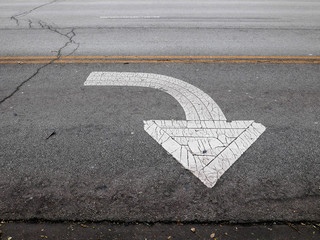 Arrow sign on the road