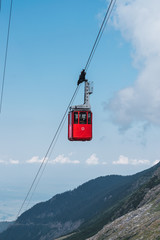 Fototapeta premium Funicular with cable car at beautiful upland area on sunny day