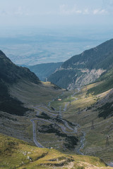 Landscape of serpentine road at evergreen mountain country