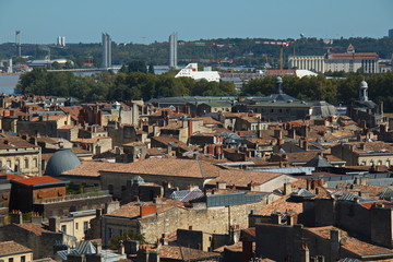 Fototapeta premium View from the tower Pey-Berland of the Cathedral Saint-Andre on the historical centre of Bordeaux and Pont Jacques Chaban-Delmas,France