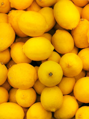 Colorful Display Of Lemons In Market. Fresh lemon 