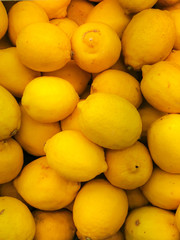Colorful Display Of Lemons In Market. Fresh lemon 