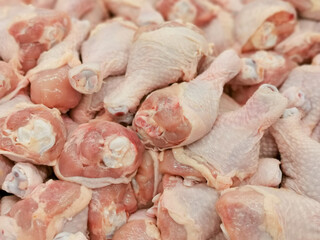 A pile of raw chicken legs