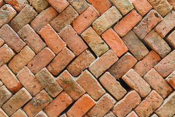 Old red brick stacked wall background texture