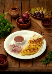 potato lule with onion and ketchup