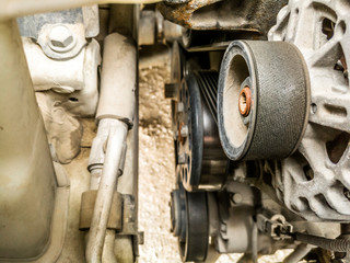 closeup of fan belt of a vehicle 