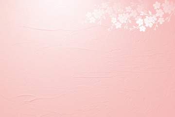 桜の花びらとピンクの壁の背景