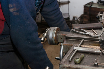 Lathe machine in workshop. metalworking on a lathe