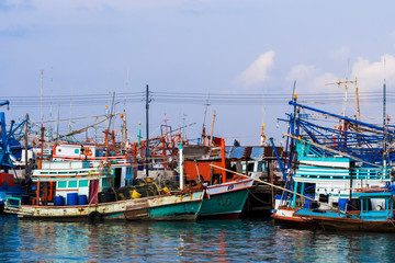 Fishermen boats at dock in the harbor.