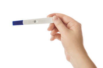 Woman hand with pregnancy test