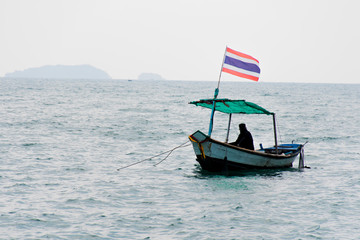 Fototapeta premium Fishing boat floating in the sea.