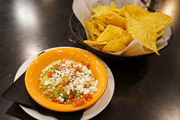 Close up Nacho cheese served with guacamole -Mexican food