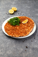 spicy lahmajun with lemon and herbs