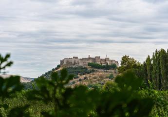 Fototapeta na wymiar Castle on the hill. Remote view of Ayasuluk Castle (Selcuk Kalesi) and St. John's Church. 