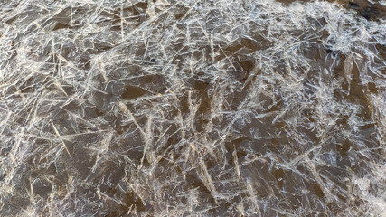 Ice Background Texture Closeup With Different Shapes and Cracks.