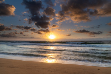 Obraz na płótnie Canvas Clouds, sea and surf sunrise seasape