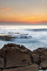 Fototapeta premium Rocky Smoke Haze Sunrise Seascape