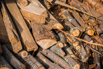 Fototapeta na wymiar Stock of firewood for winter, wood closeup