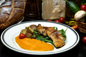 fried fish with potato and sauce