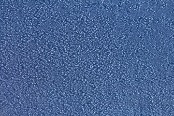 part of an umbrella covered with ice and hoarfrost
